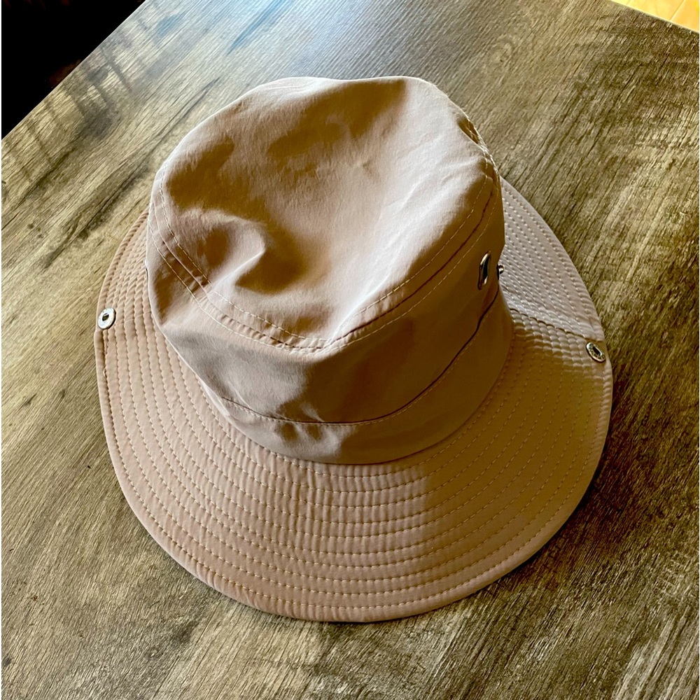 SC 484 snap brim tan hat. With chin strap